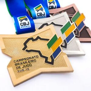 Medalha em metal com banho de ouro níquel e cobre velho