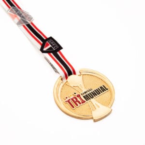 Medalha em metal banho de ouro com fita digital